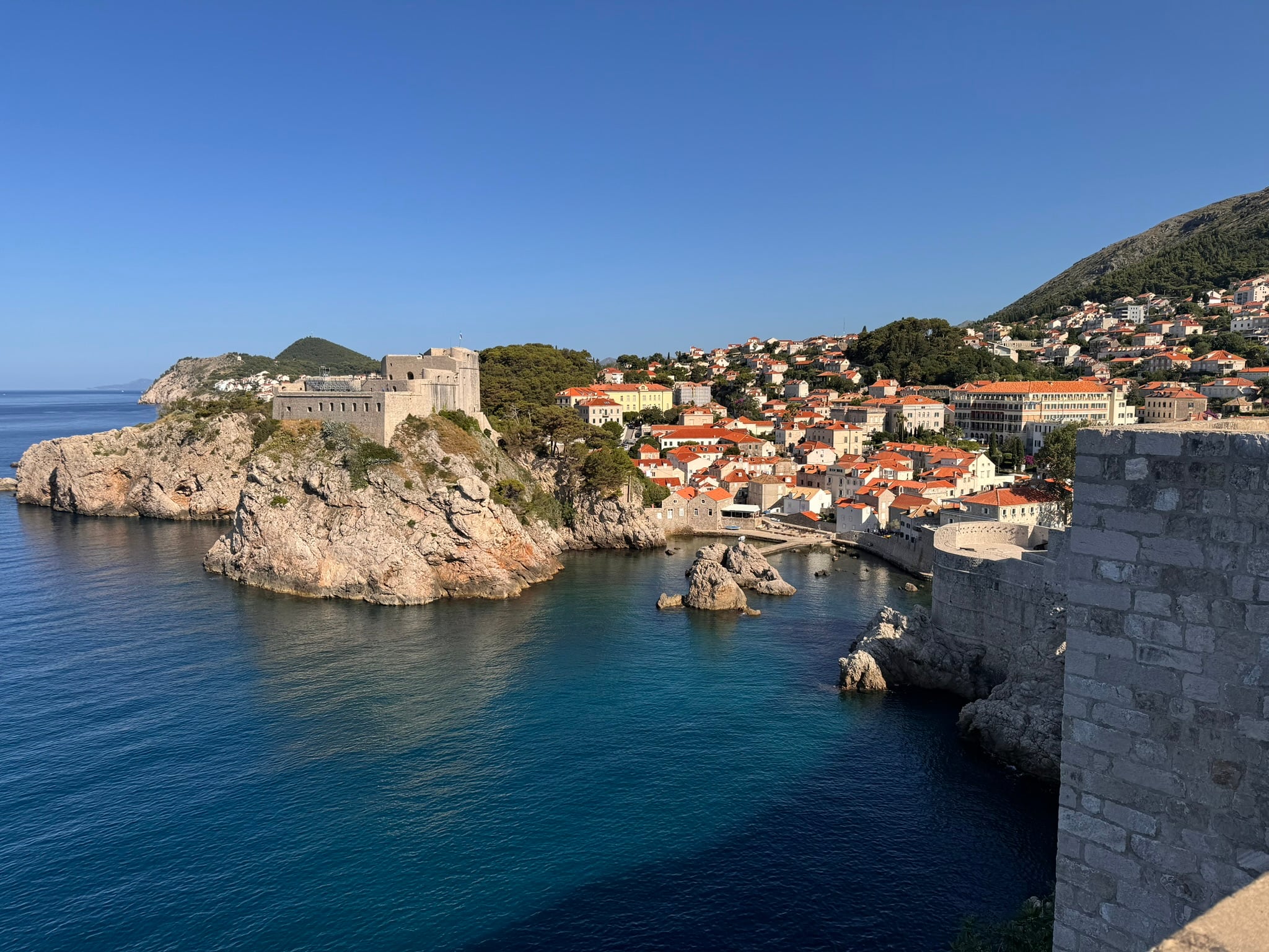 Dubrovnik's city walls curving out into the Adriatic